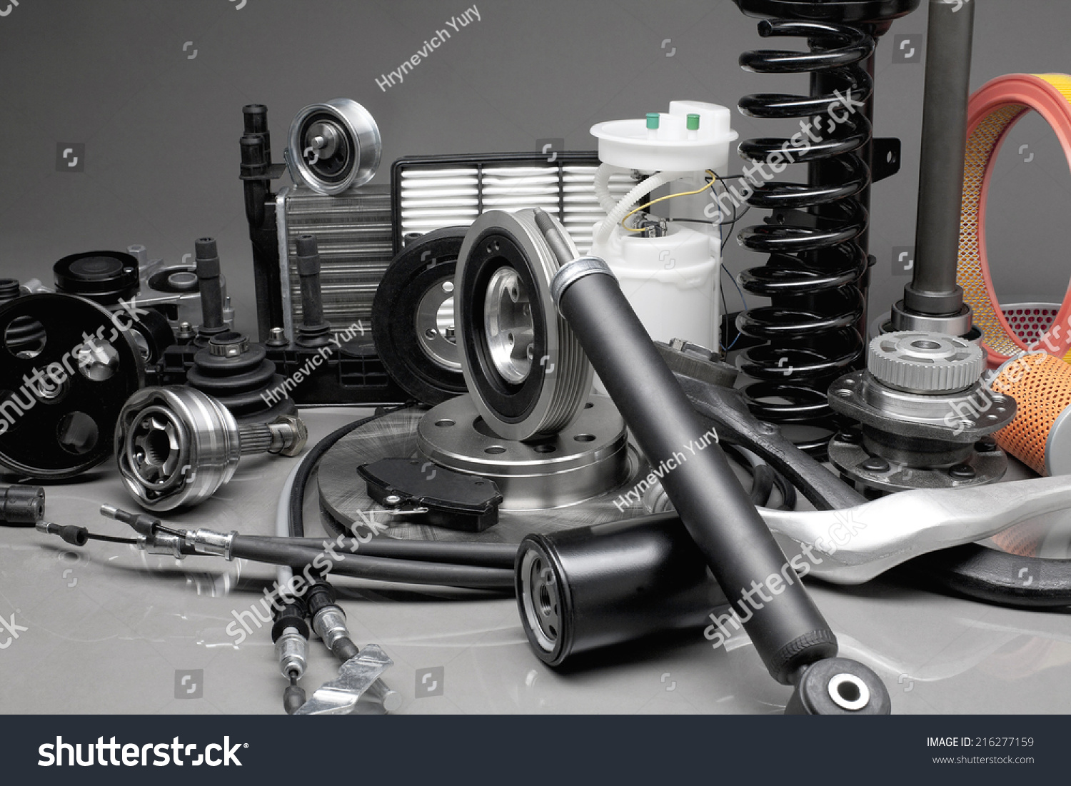 New Car Parts On A Gray Background Stock Photo 216277159 : Shutterstock