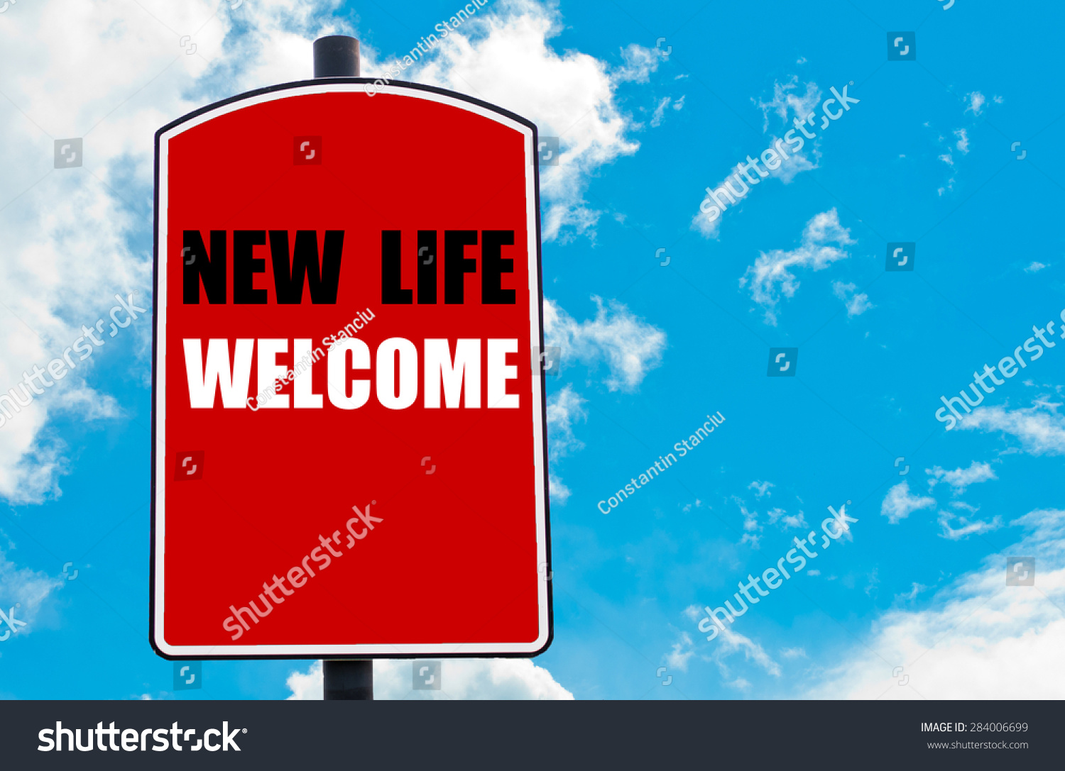 New Life Wel e motivational quote written on red road sign isolated over clear blue sky background