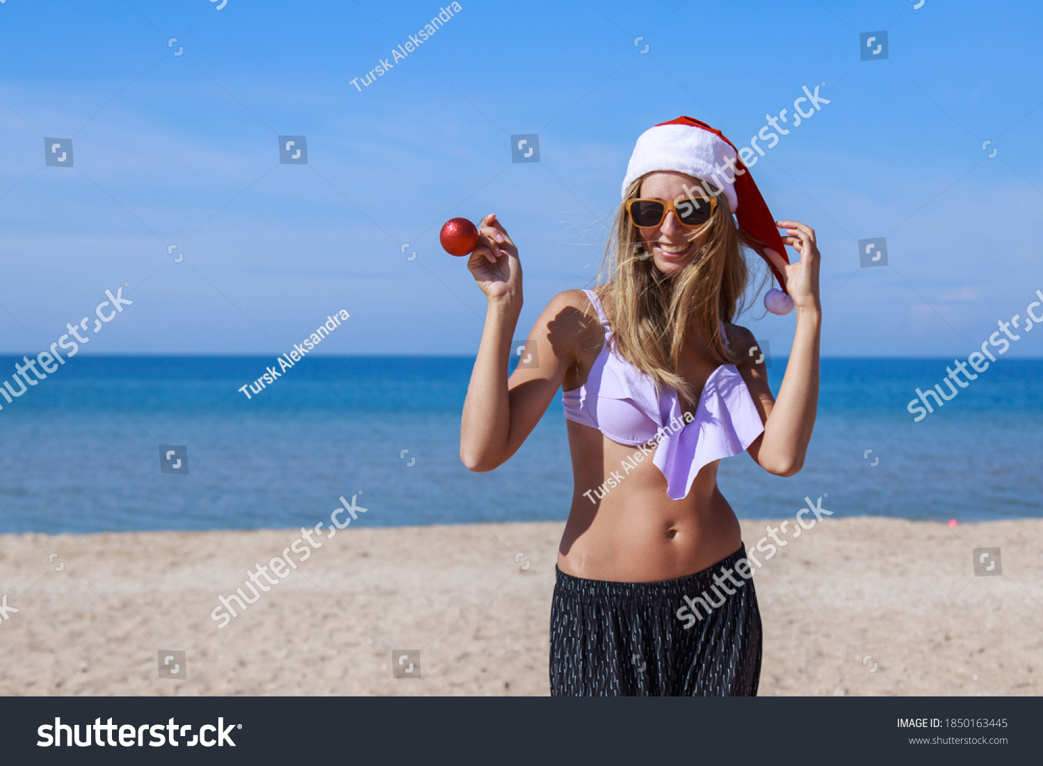 Blonde Chick Enjoying Sex near Sea Beach with Santa Claus
