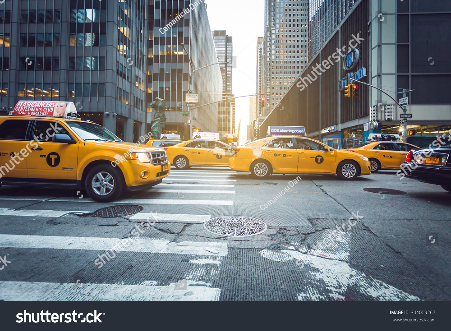 What other cities than New York use yellow cabs?