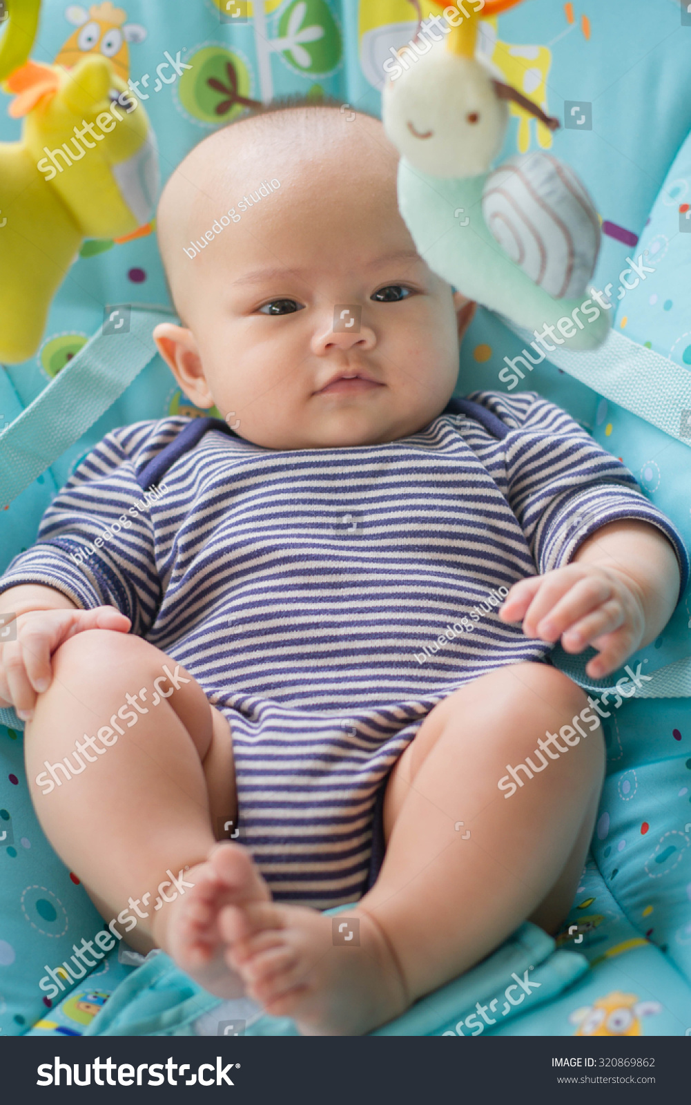 baby sleeping in bouncer