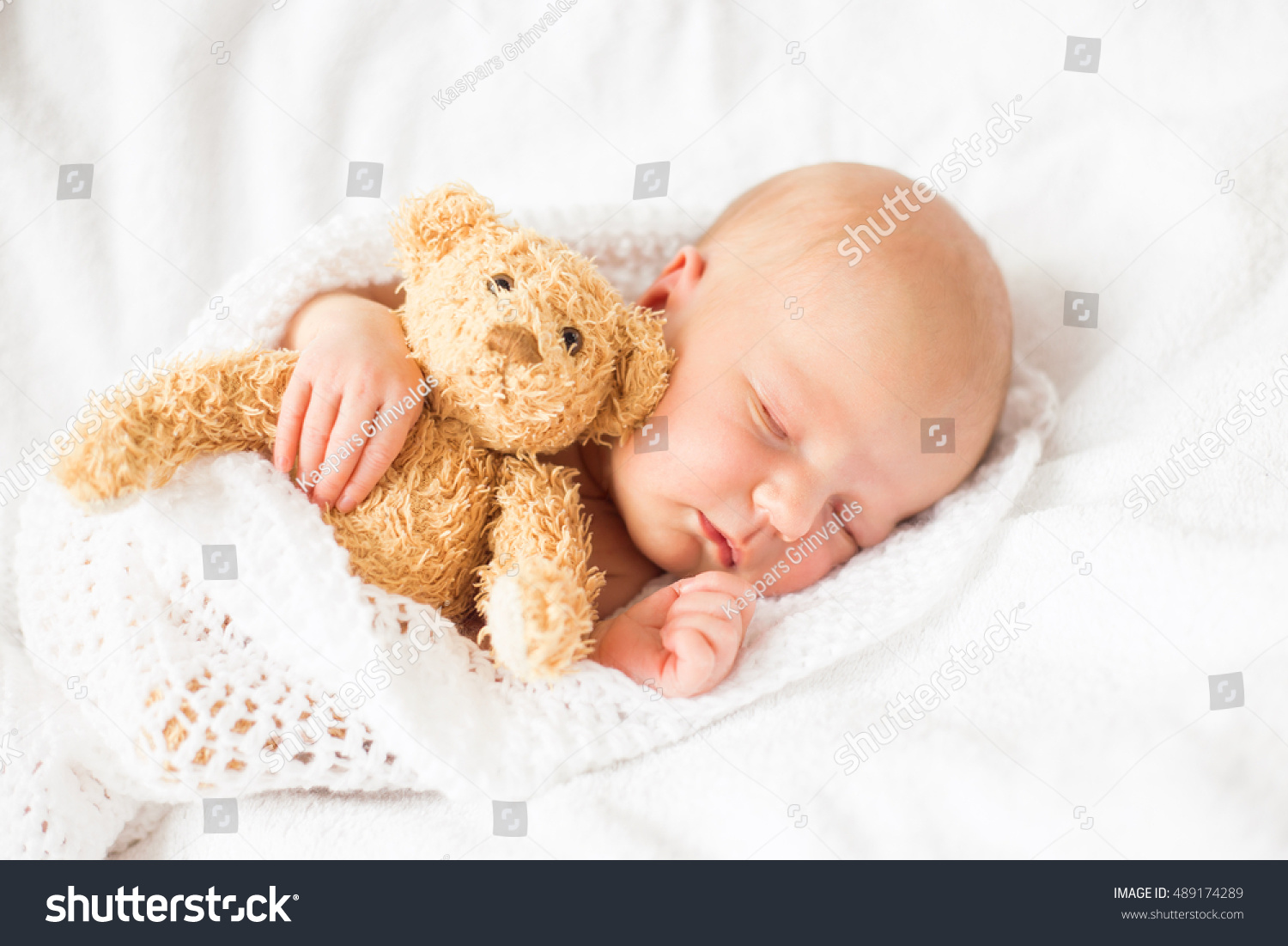 baby sleeping teddy