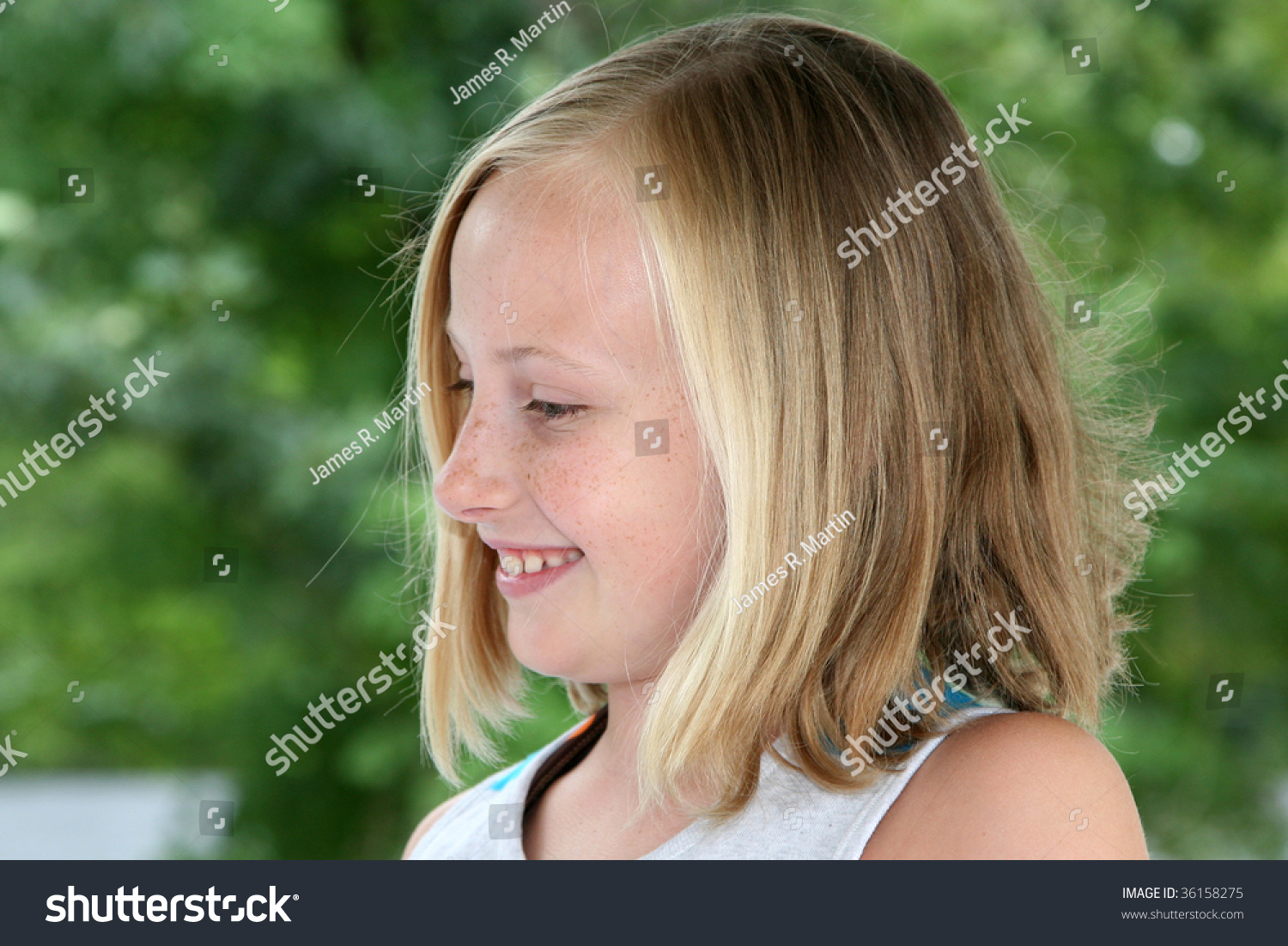 nine-year-old-girl-shown-profile-stock-photo-36158275-shutterstock