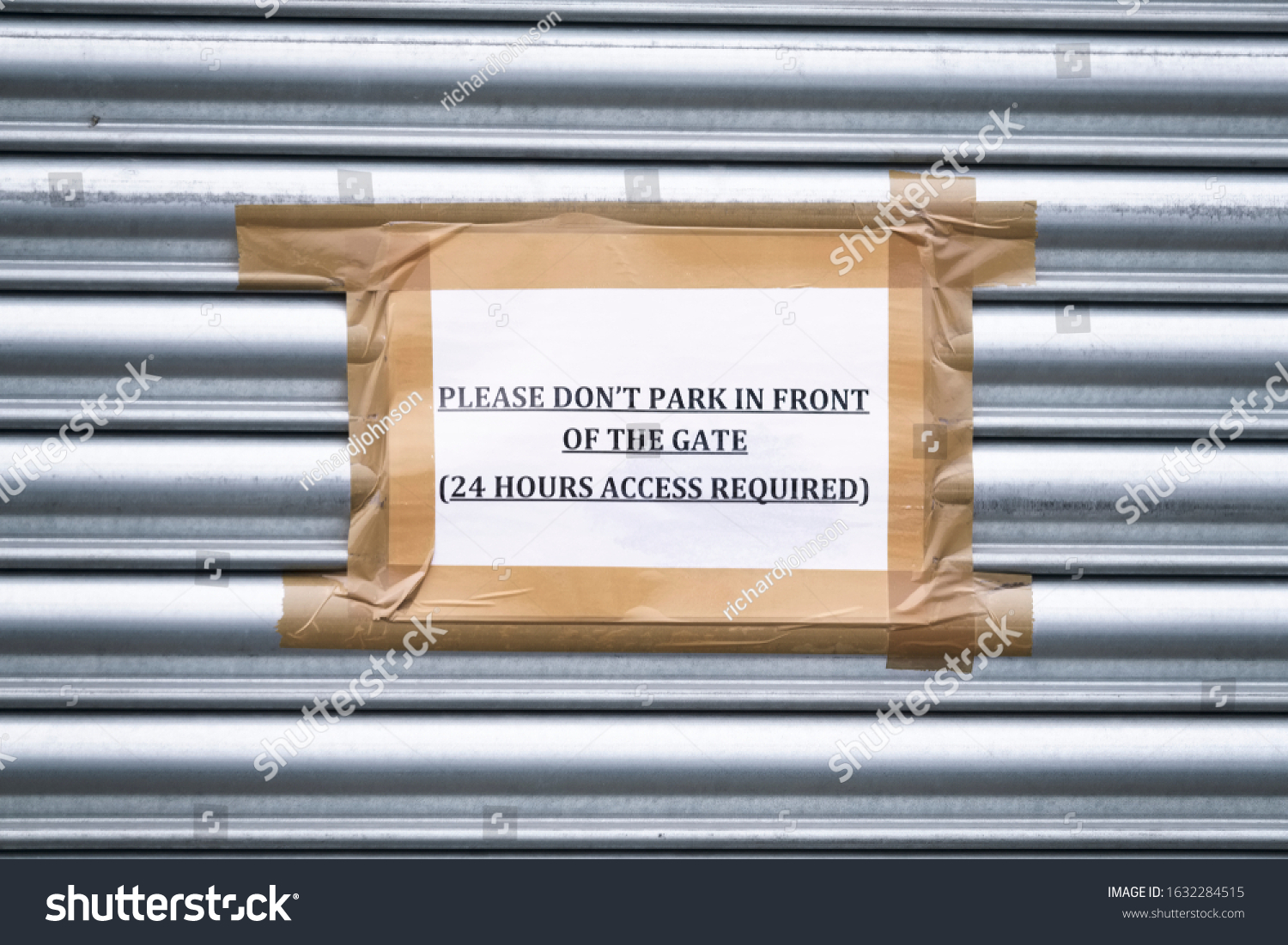 'PLEASE DO NOT PARK IN FRONT OF THIS GATE AS IT IS IN CONSTANT USE' SIGN 
