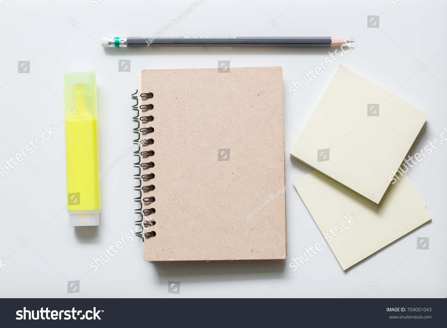 Notepad Pencil On White Background Using Stock Photo 704001043