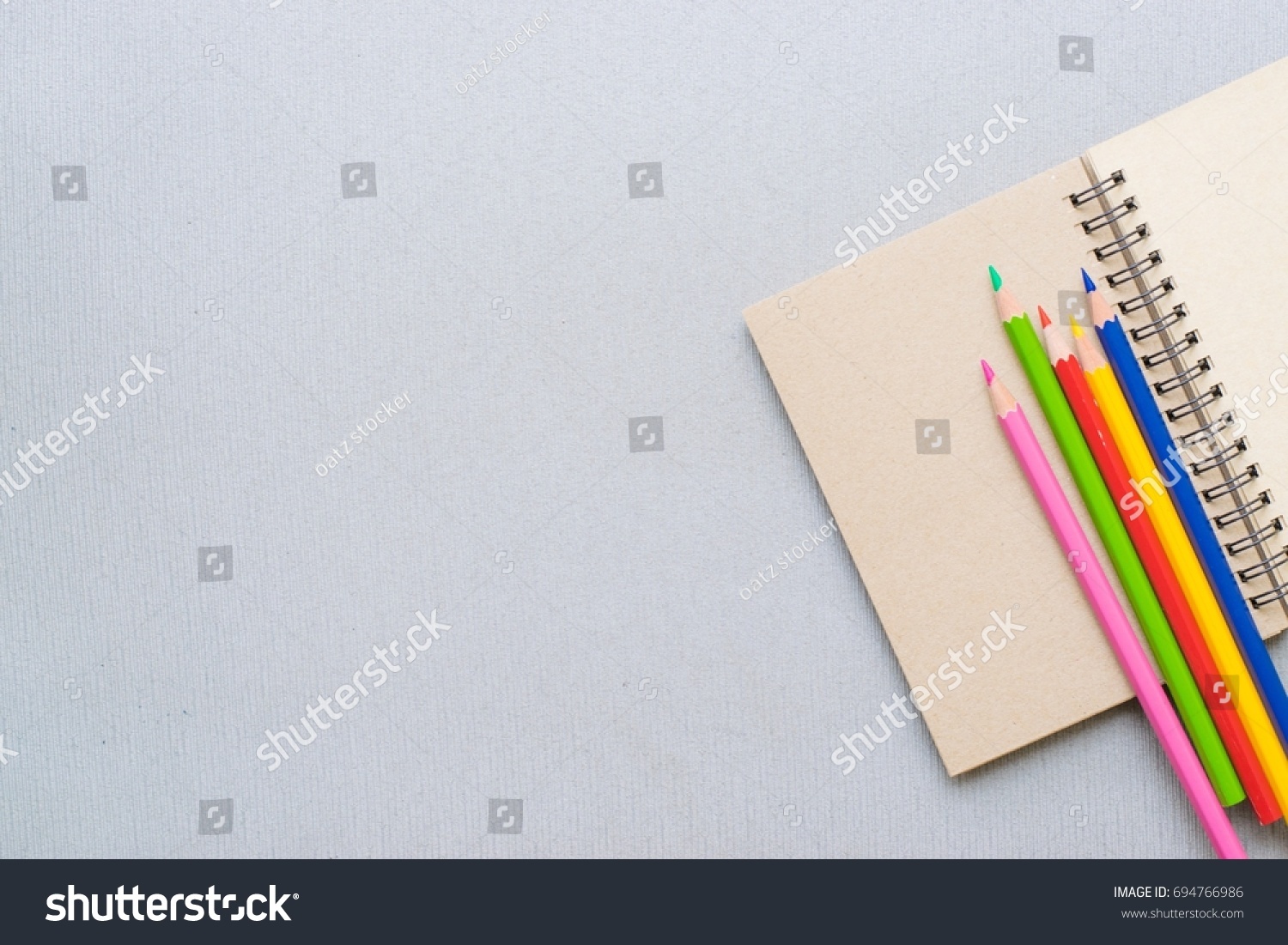 Notepad Pencil On Wood Board Background Stock Photo 694766986