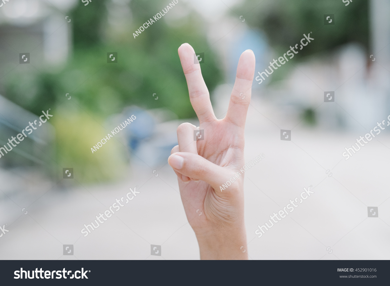 numbers-two-in-sign-language-stock-photo-452901016-shutterstock