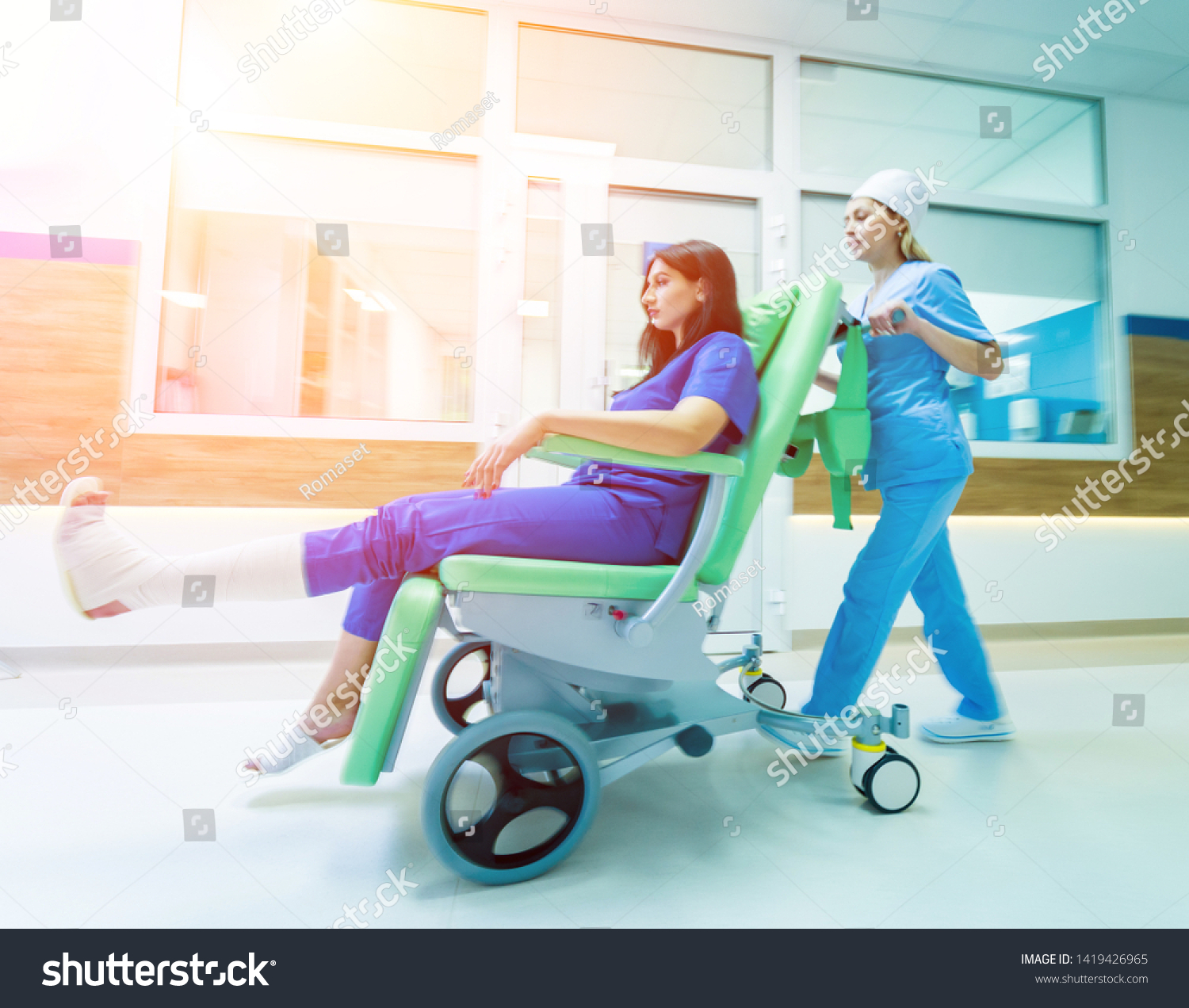Nurse Moves Mobile Medical Chair Patient Stock Photo Edit Now