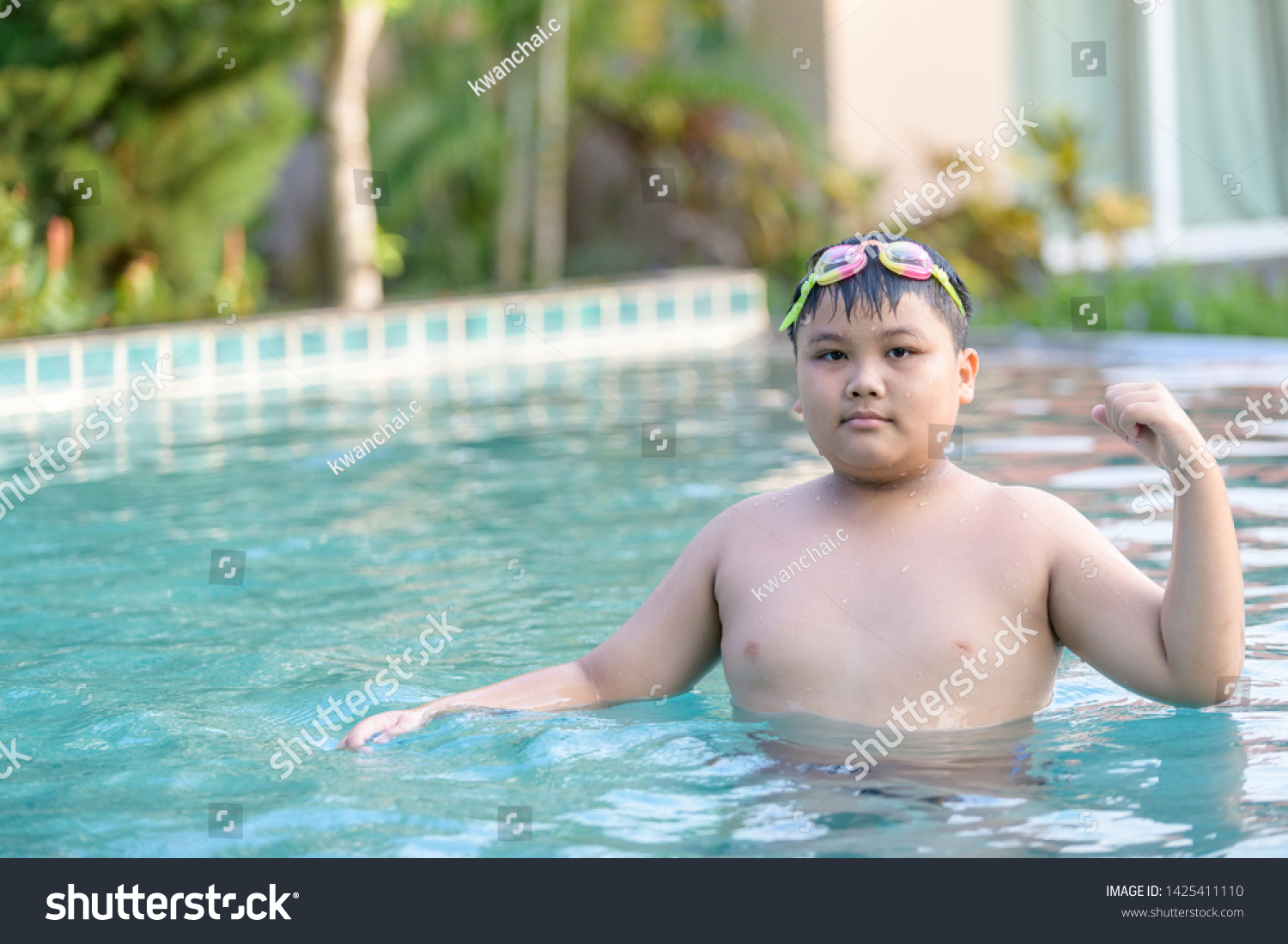 401 Overweight boy swimming Images, Stock Photos & Vectors | Shutterstock