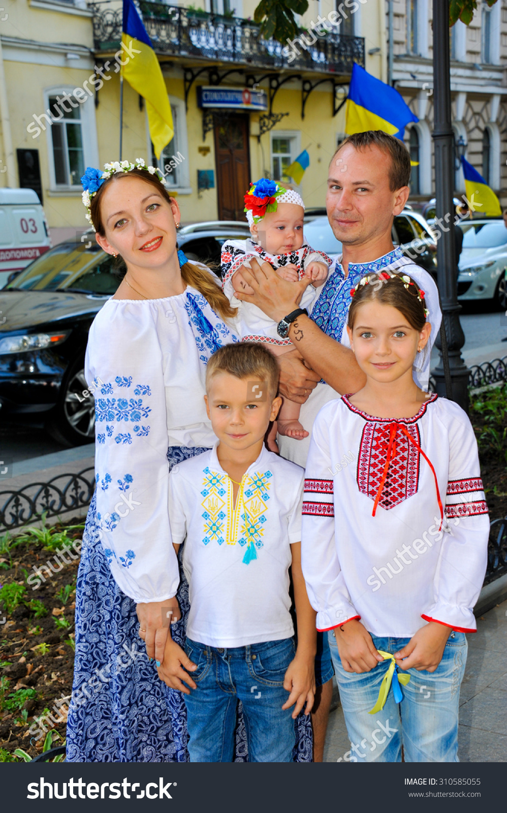 stock-photo-odessa-ukraine-august-ukrainian-family-in-national-costumes-at-independence-day-on-august-310585055.jpg