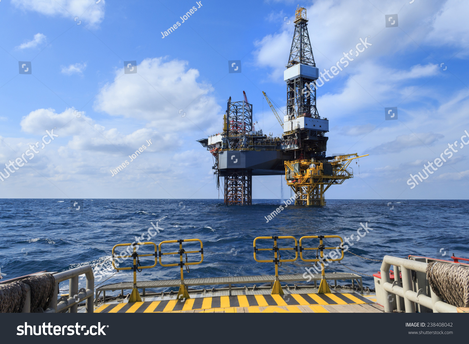 Offshore Jack Up Drilling Rig Over The Production Platform In The ...