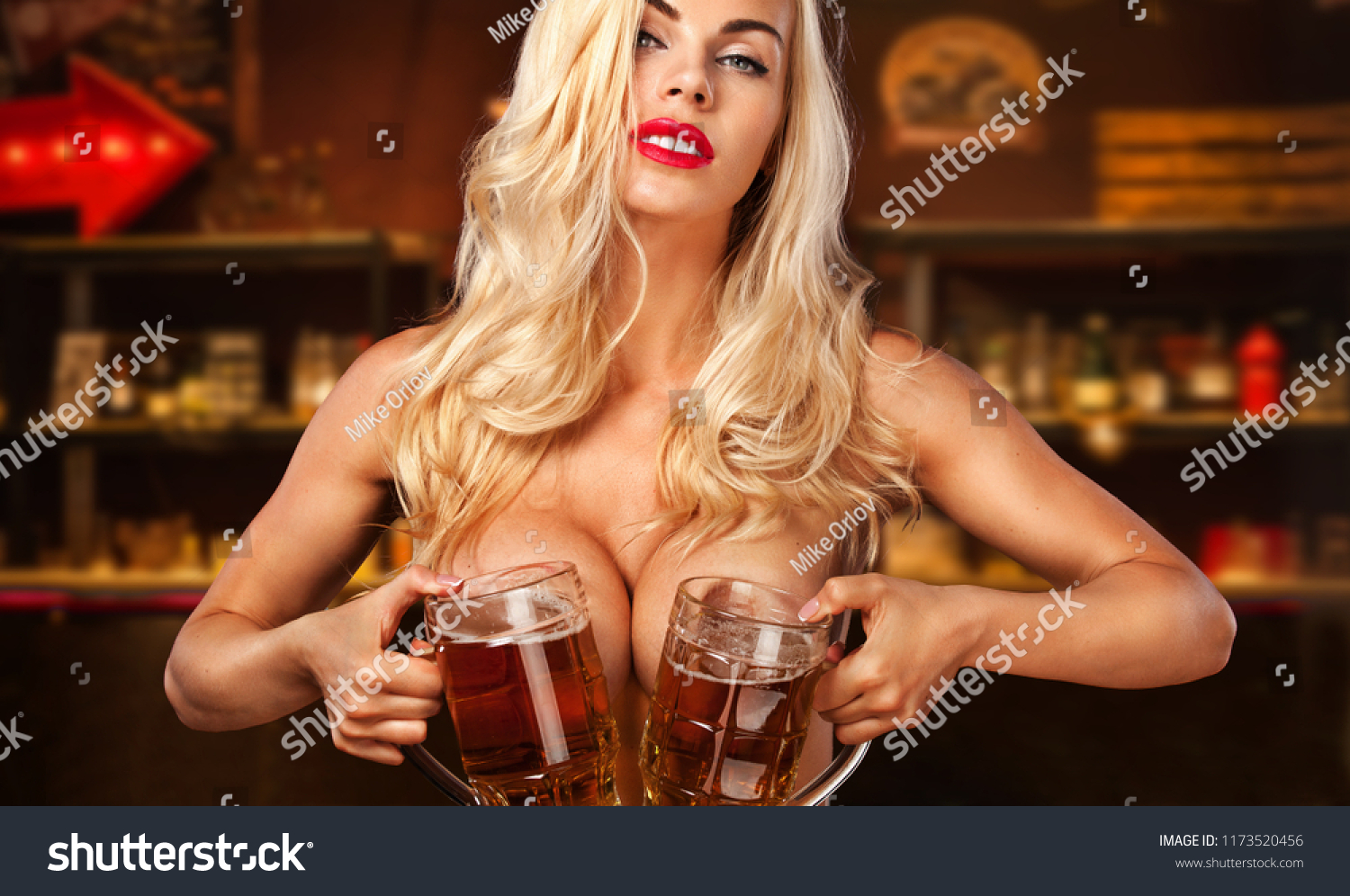 https://image.shutterstock.com/z/stock-photo-oktoberfest-beer-fest-young-sexy-and-naked-woman-serving-big-mugs-in-the-bar-1173520456.jpg