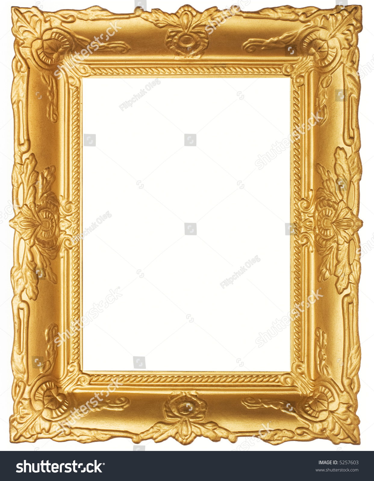 Old beautiful ornated golden antique frame. Isolated on white
