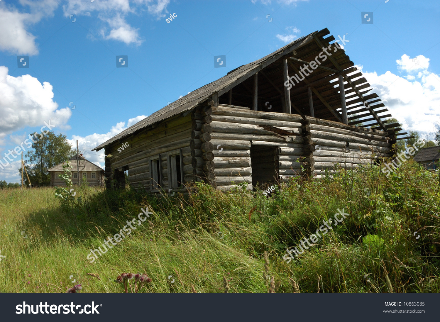 Old Broken Wooden Hut In Russian Village, Green Grass Around Stock ...