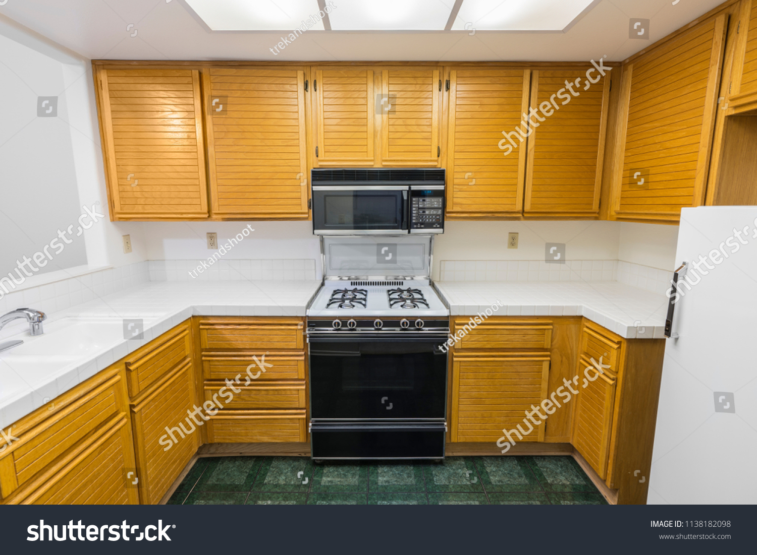 Old Condo Kitchen Oak Cabinets Tile Stock Photo Edit Now 1138182098