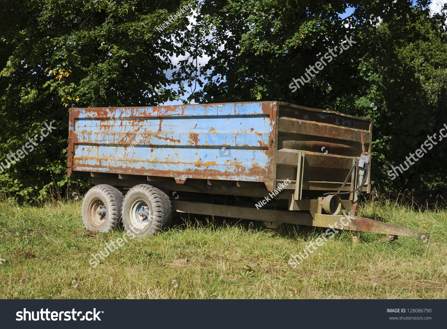 Old Farm Trailer Once Painted Blue Now Rusty Old Farm Trailer Once Painted Blue Now Rusty