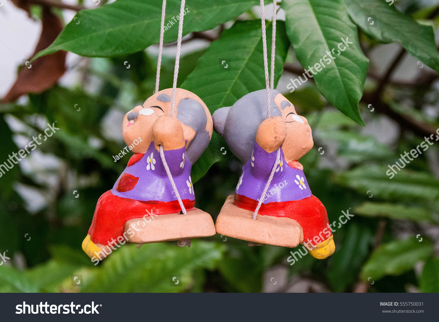 old man and woman ceramic dolls