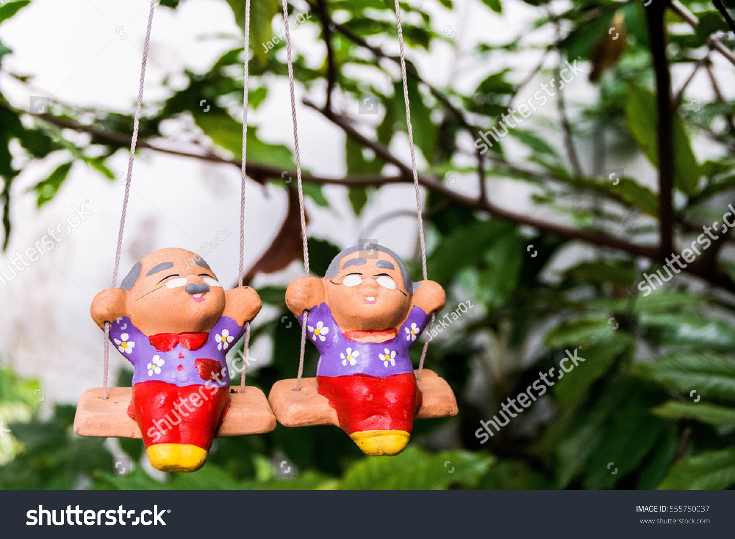 old man and woman ceramic dolls