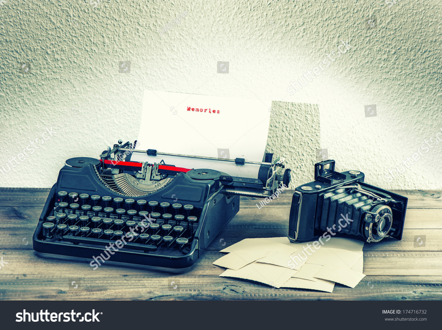 Old Mechanical Typewriter And Vintage Photo Camera On Wooden Background Antique Objects Memories Concept Old Mechanical Typewriter And Vintage Photo Camera On Wooden Background Antique Objects Memories Concept