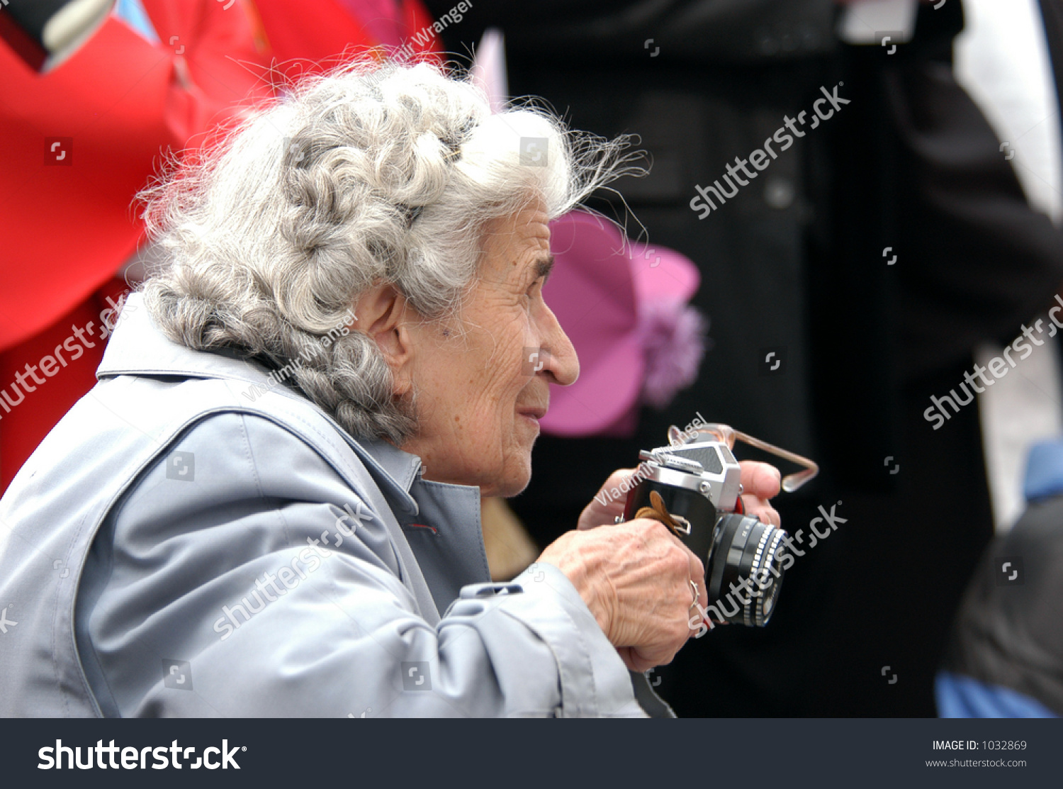 Old Paparazzi: An Old Woman Taking Photos With A Retro Camera ...