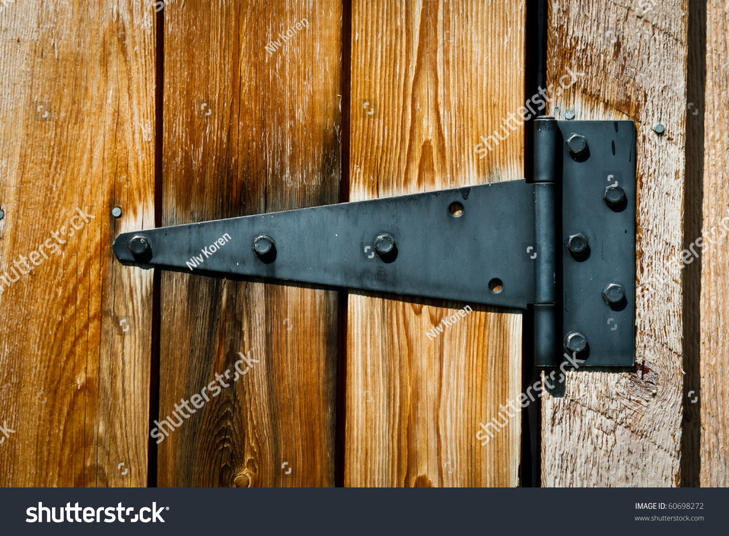 Stock Photo Old Rusty Hinge On Wooden Door 60698272 