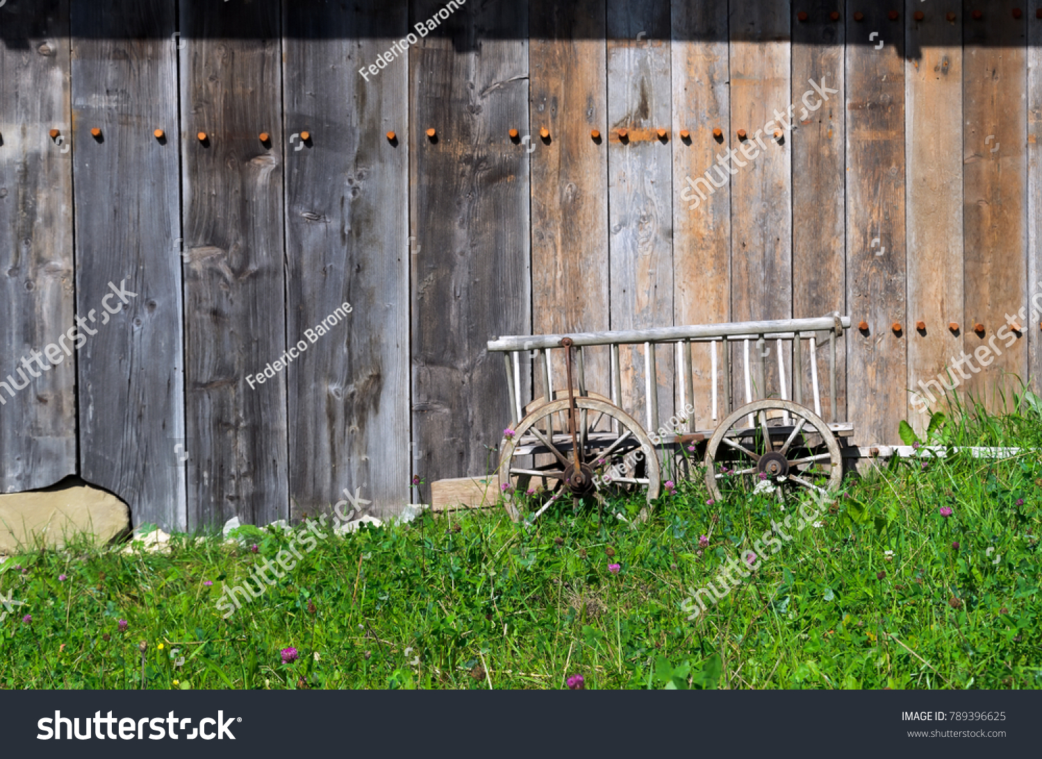 stock-photo-old-wooden-small-cart-side-b