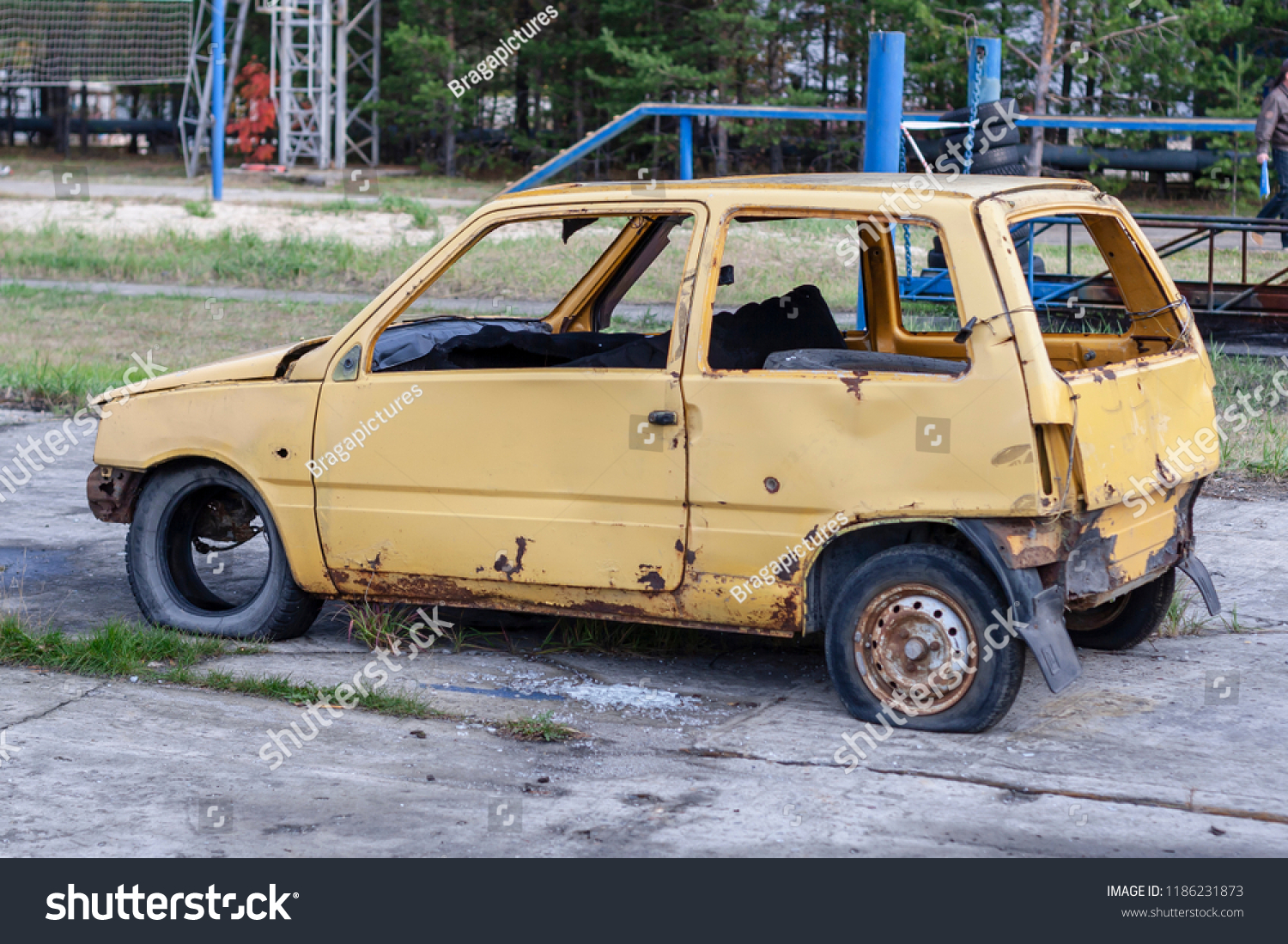 Download Old Yellow Broken Car Open Air Stock Photo Edit Now 1186231873 Yellowimages Mockups