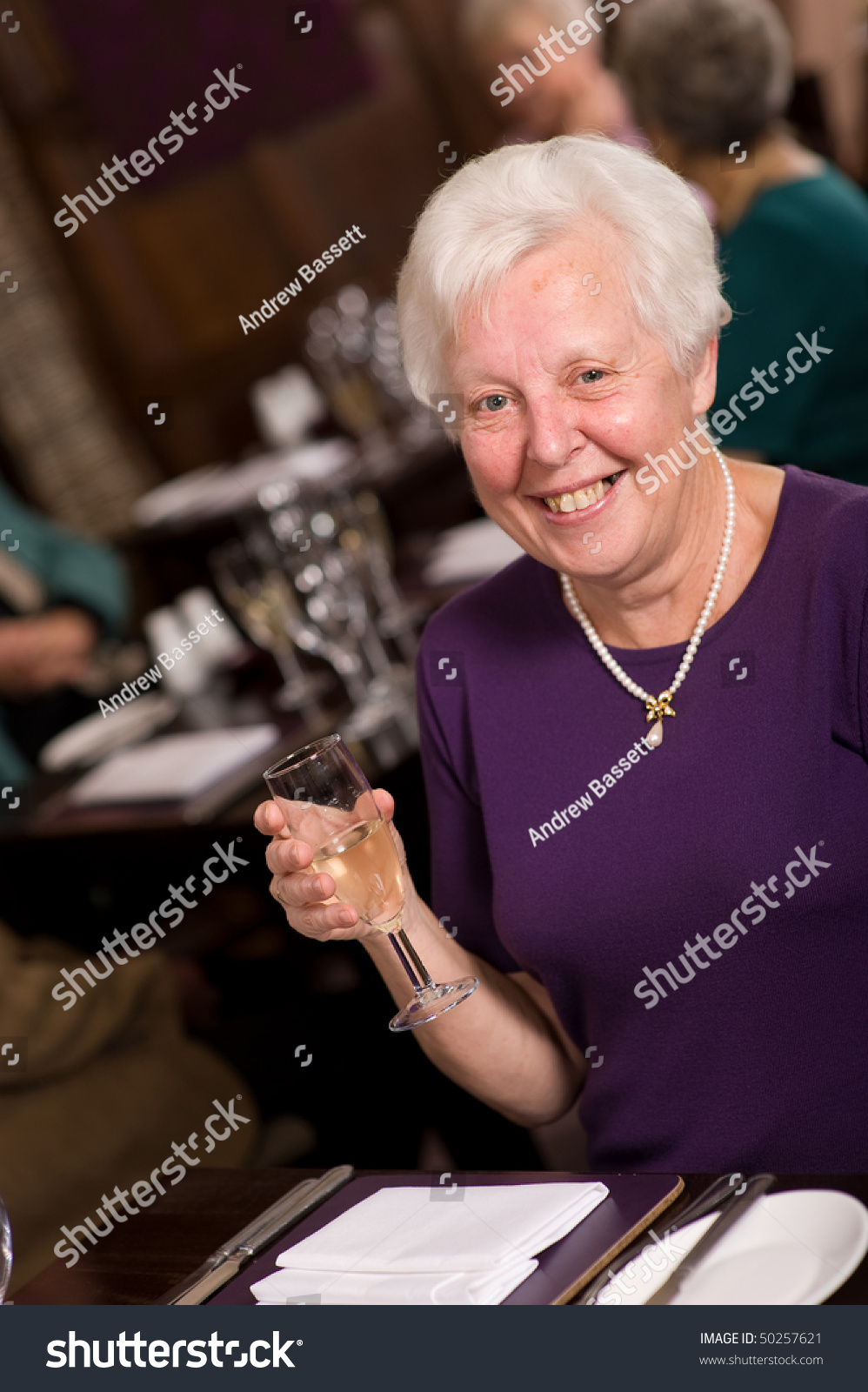 Older Mature Senior Lady Celebrating In Posh Restaurant Stock Photo ...