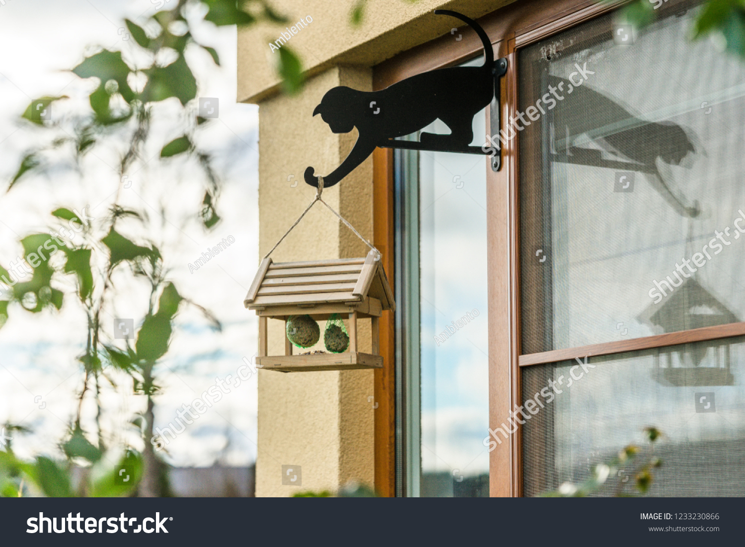 On Window Frame Mounted Bird Feeder Stock Photo Edit Now 1233230866