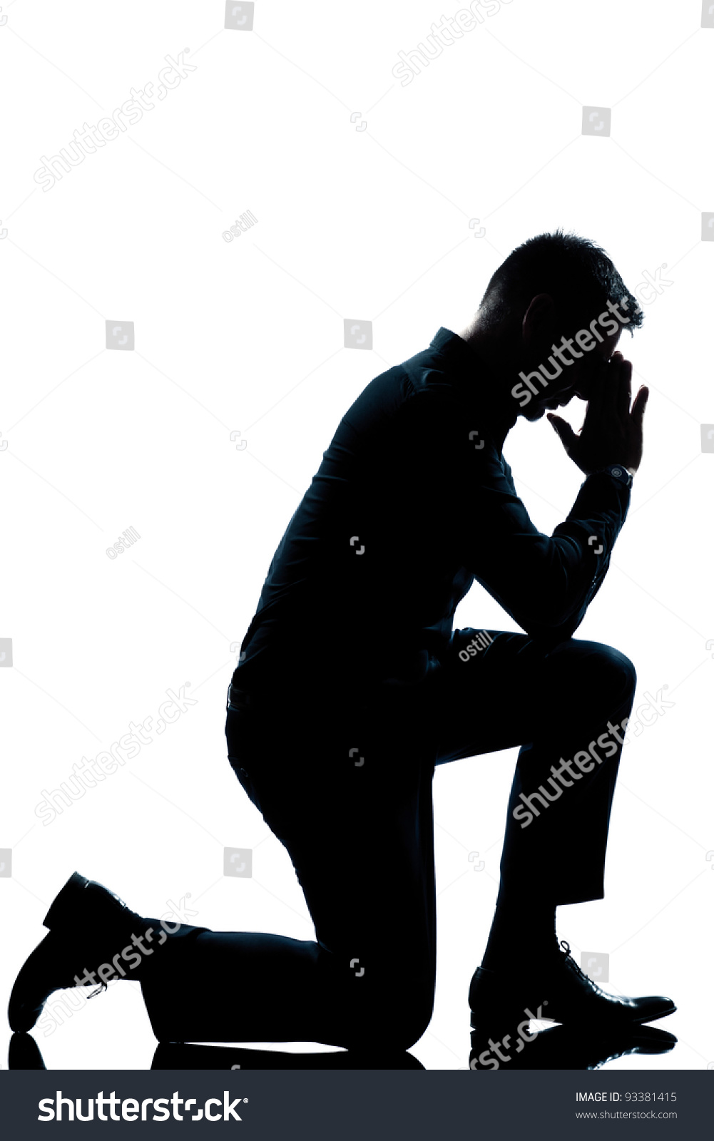 One Caucasian Man Kneeling Full Length Silhouette In Studio Isolated ...