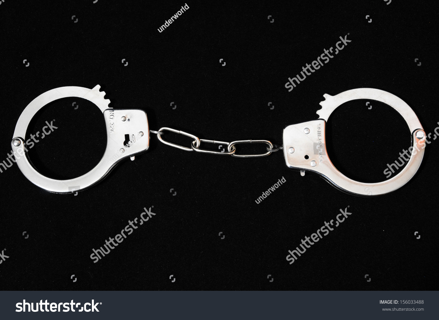 One Pair Of Handcuffs On A Black Background Stock Photo 156033488 ...