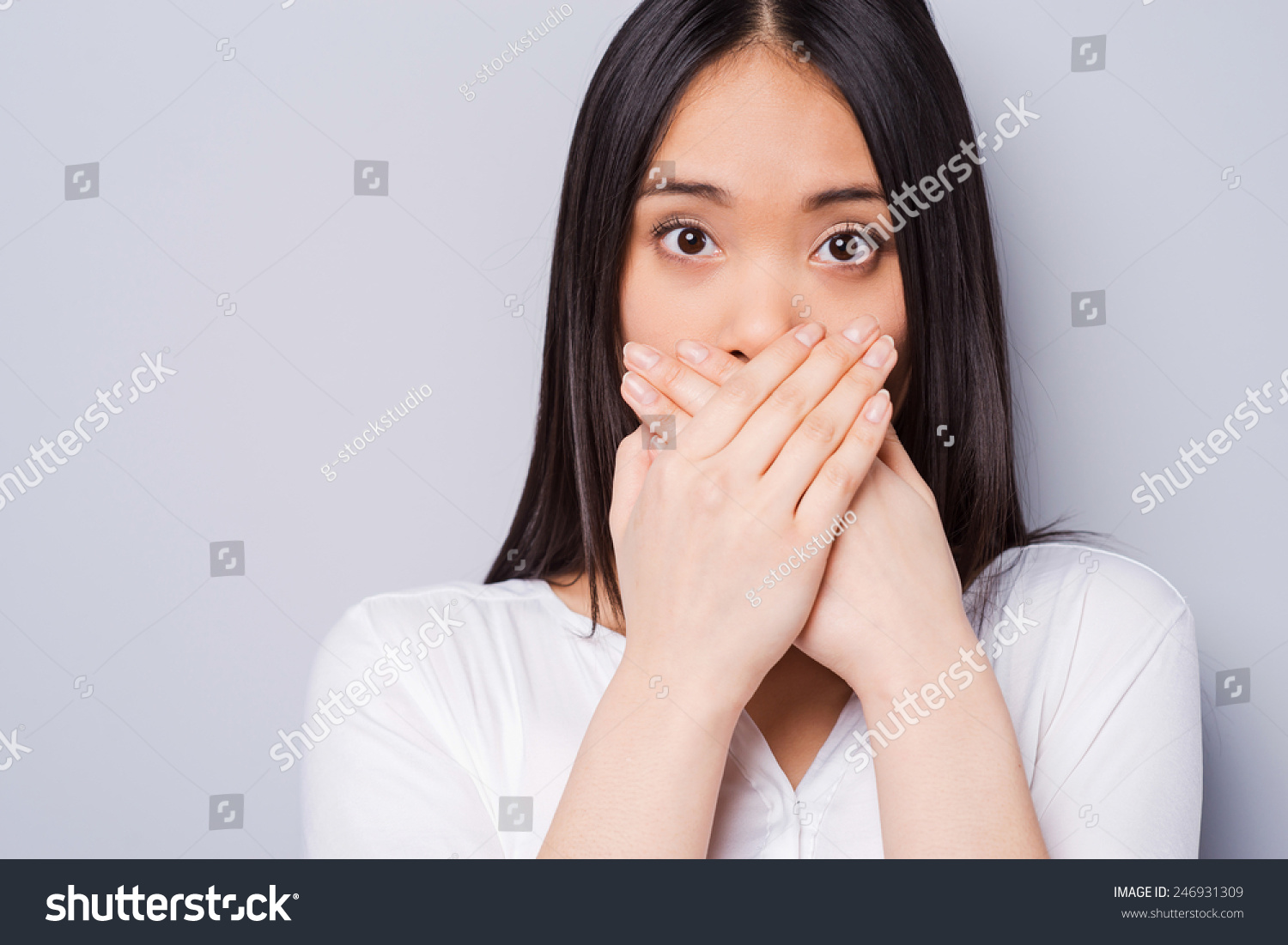 Oops! Surprised Young Asian Woman Covering Mouth With Hands And Staring ...