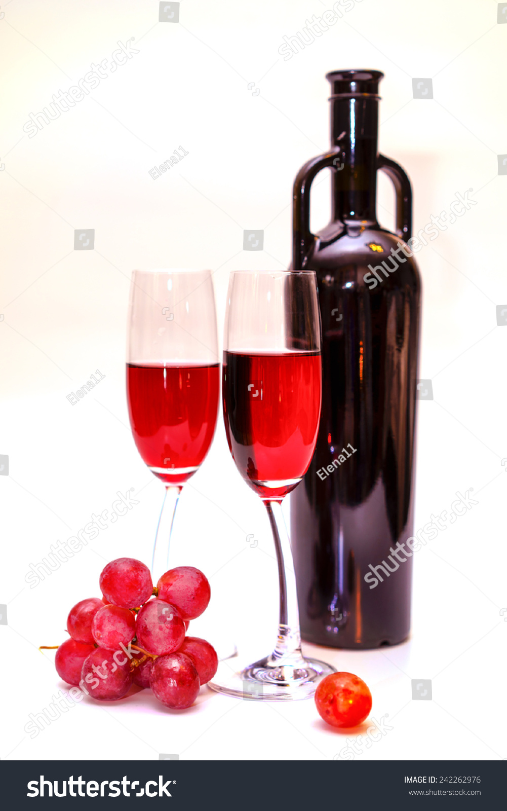 Download Original Red Vine Bottle Red Grapes Stock Photo Edit Now 242262976 PSD Mockup Templates