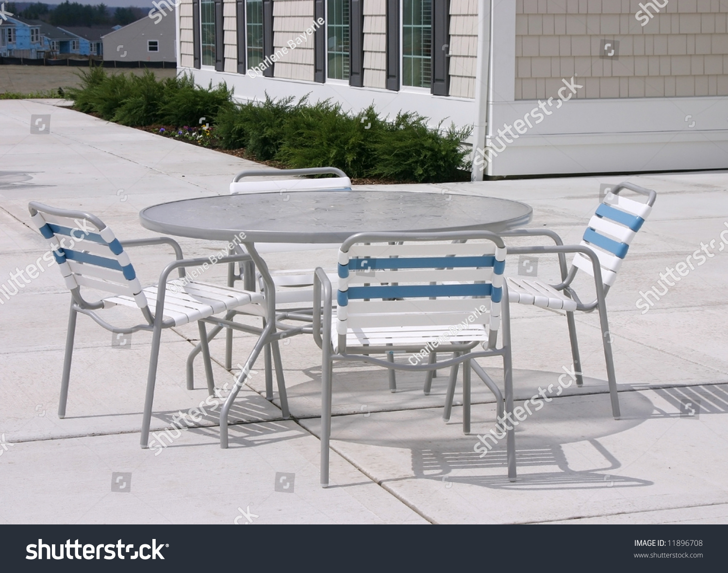 Outdoor Furniture On Cement Patio Stock Photo Edit Now 11896708