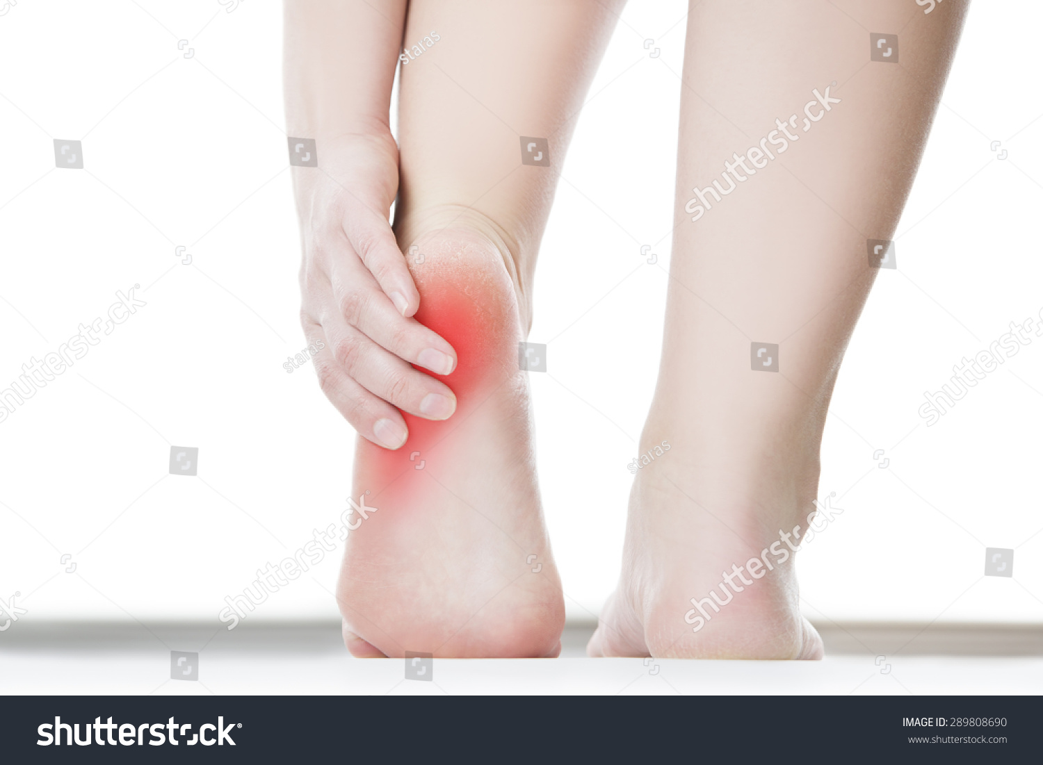 Pain In The Foot. Massage Of Female Feet. Pedicures. Isolated On White ...