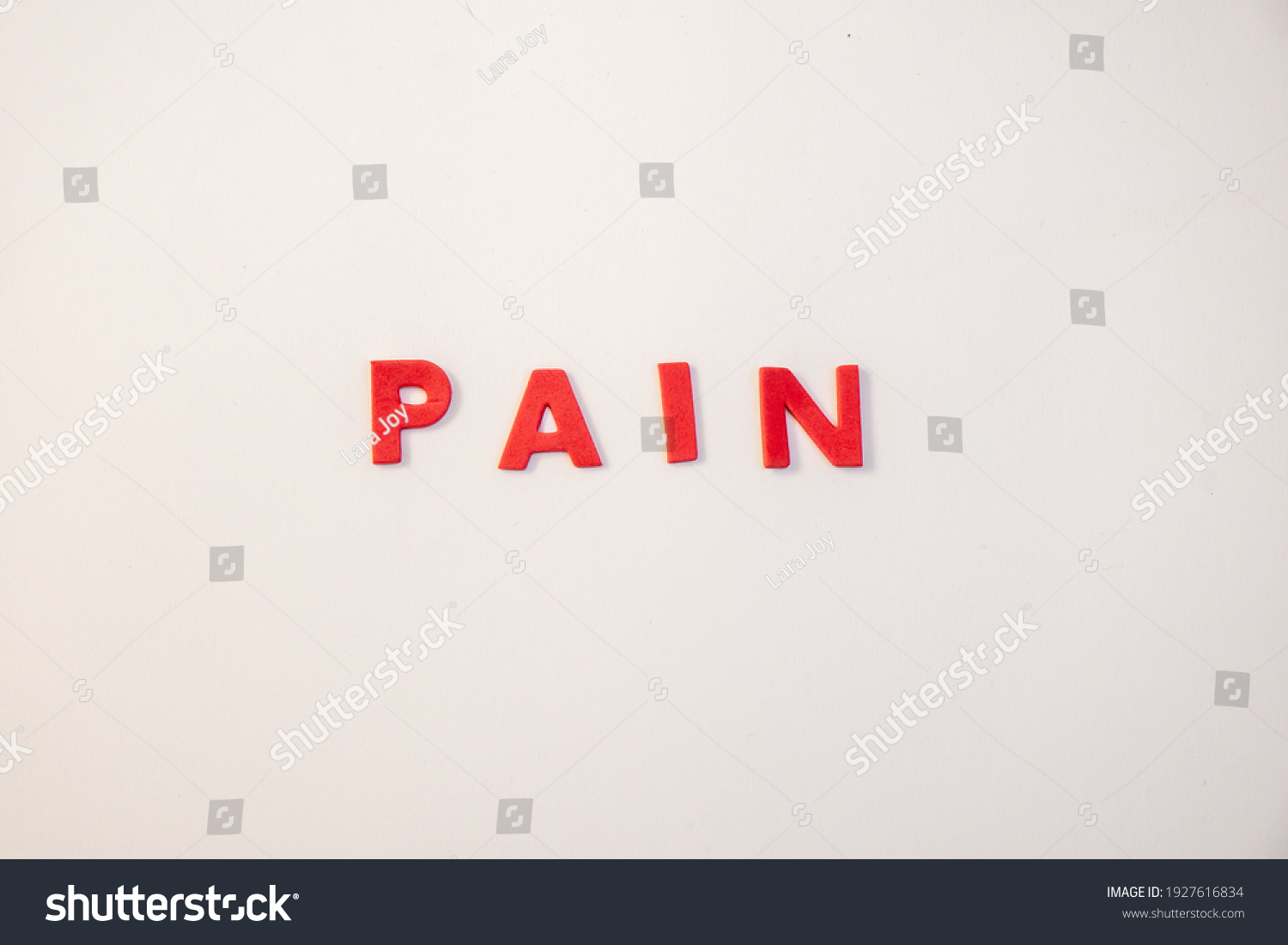 pain-letters-text-painful-headline-medical-stock-photo-1927616834