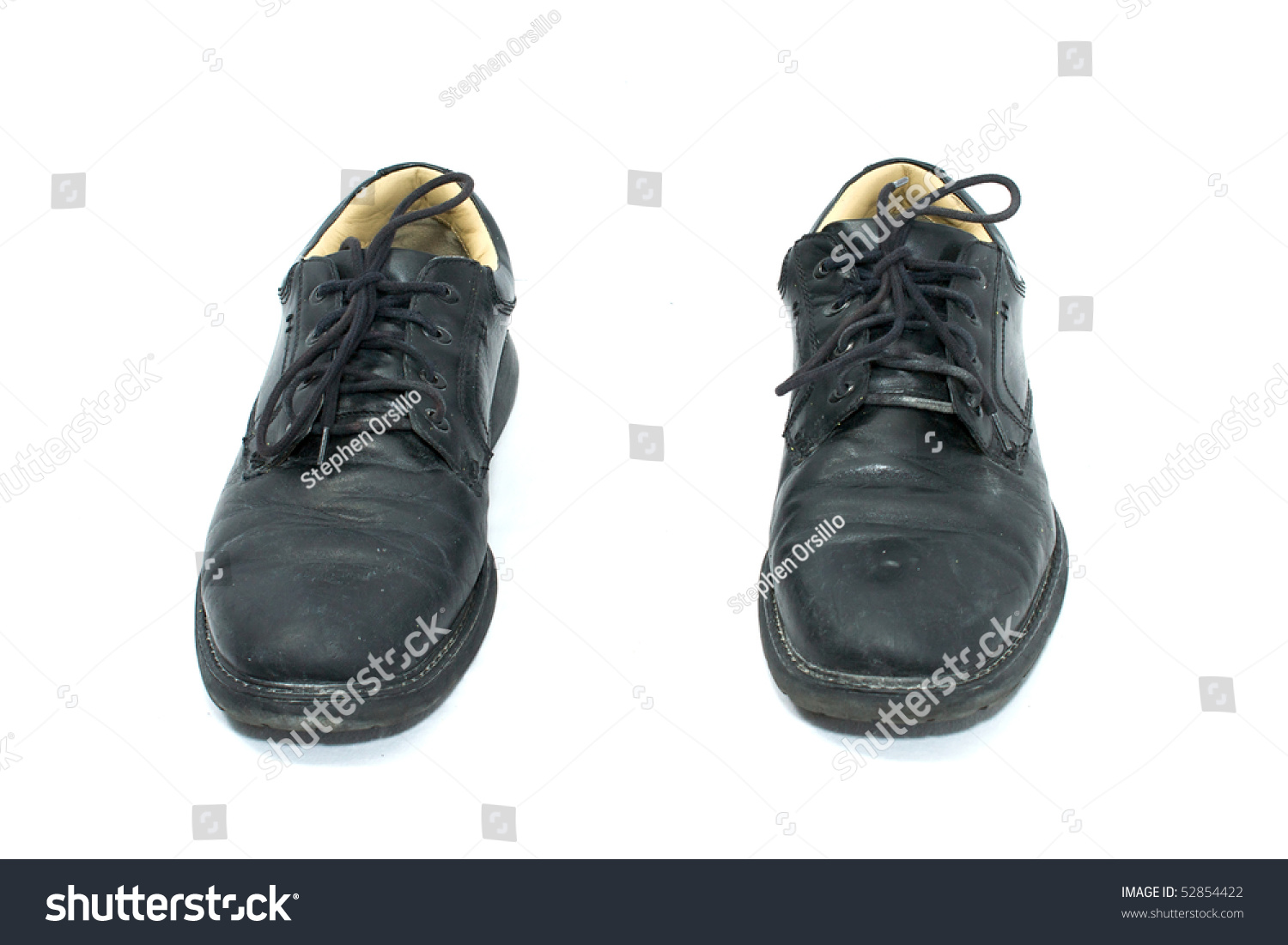 Pair Of Dirty Black Work Shoes On White, Seen From Front Stock Photo ...