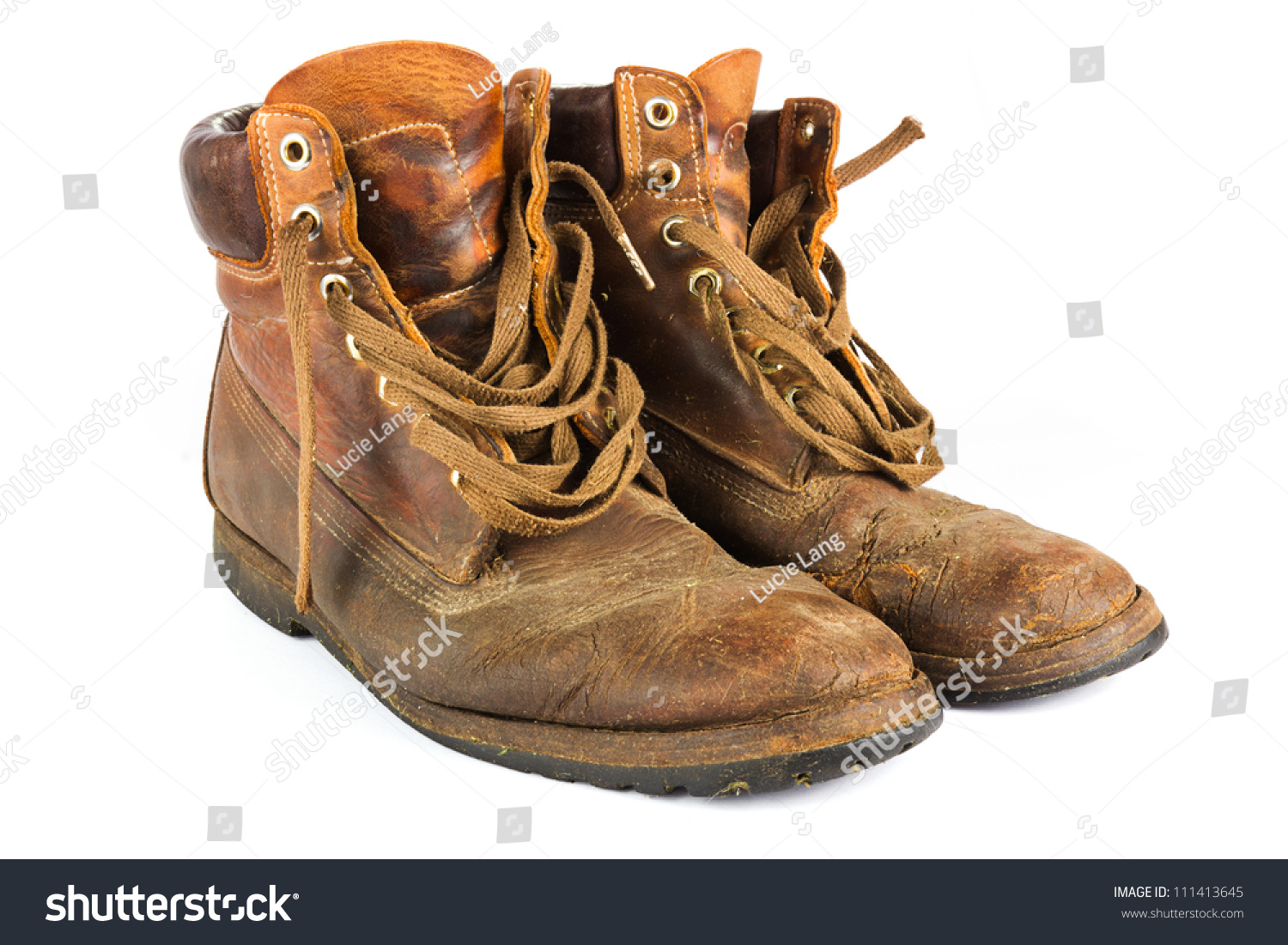 Pair Of Old Worn Brown Leather Work Boots On White Stock Photo ...