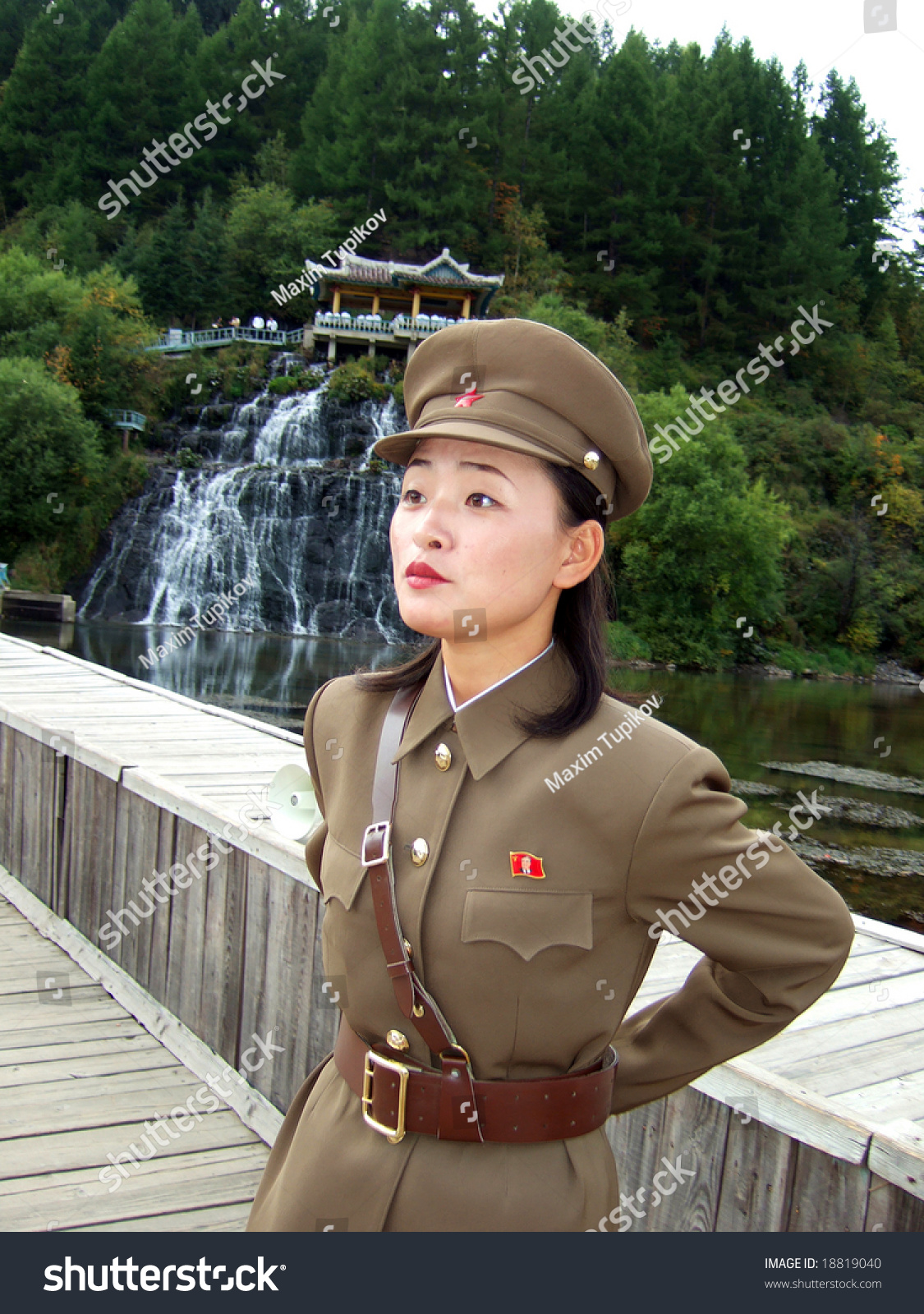 Svaki dan neka ratna obljetnica, a uz nju odmah i misa - Page 3 Stock-photo-paktusan-september-north-korean-military-woman-guard-at-the-outpost-near-paktusan-mountain-18819040