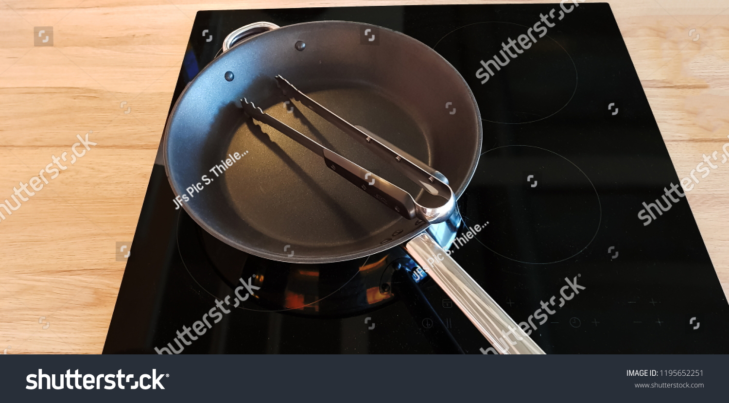 Pan On Modern Black Induction Stove Food And Drink Objects