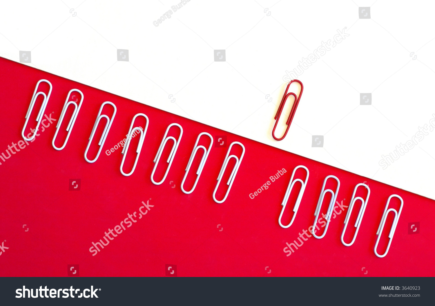 Paperclip Arranged On White Red Backgrounds Stock Photo 3640923