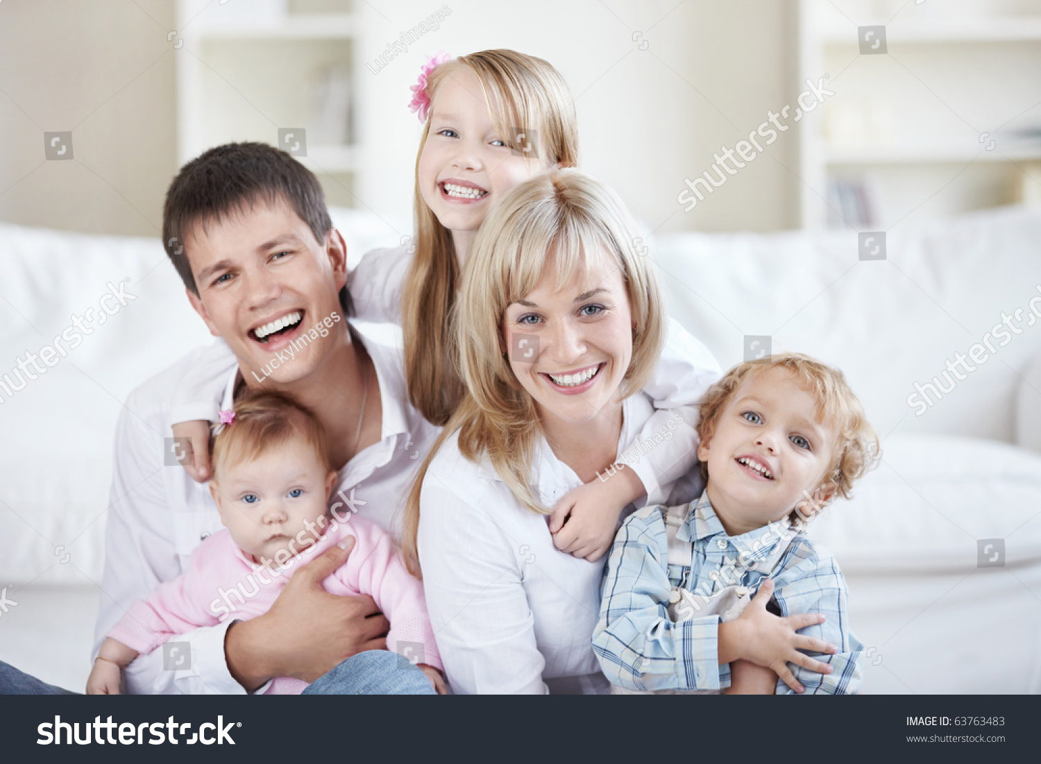 Parents And Three Children At Home Stock Photo 63763483 : Shutterstock