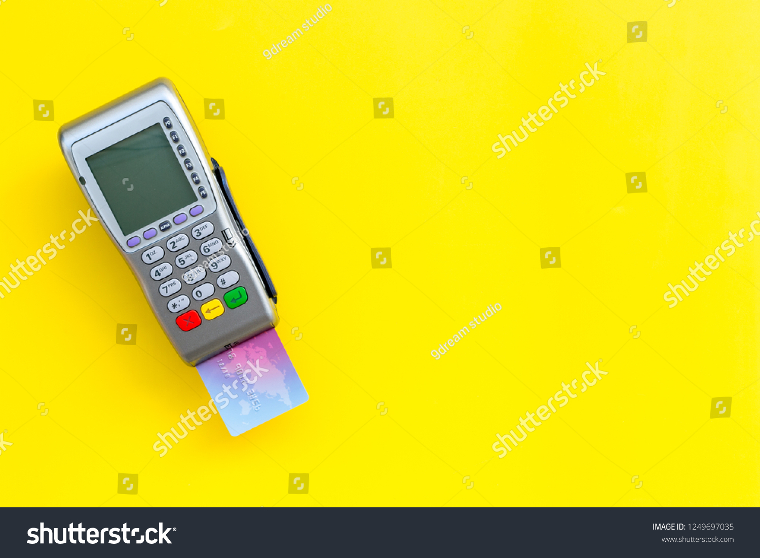 pay-by-card-bank-card-inserted-1249697035-shutterstock