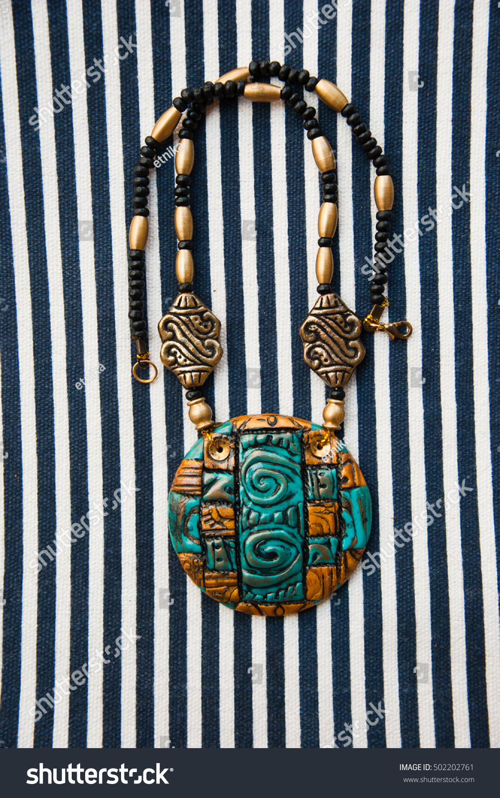 Unique piece Egyptian pendant handmade with polymer clay