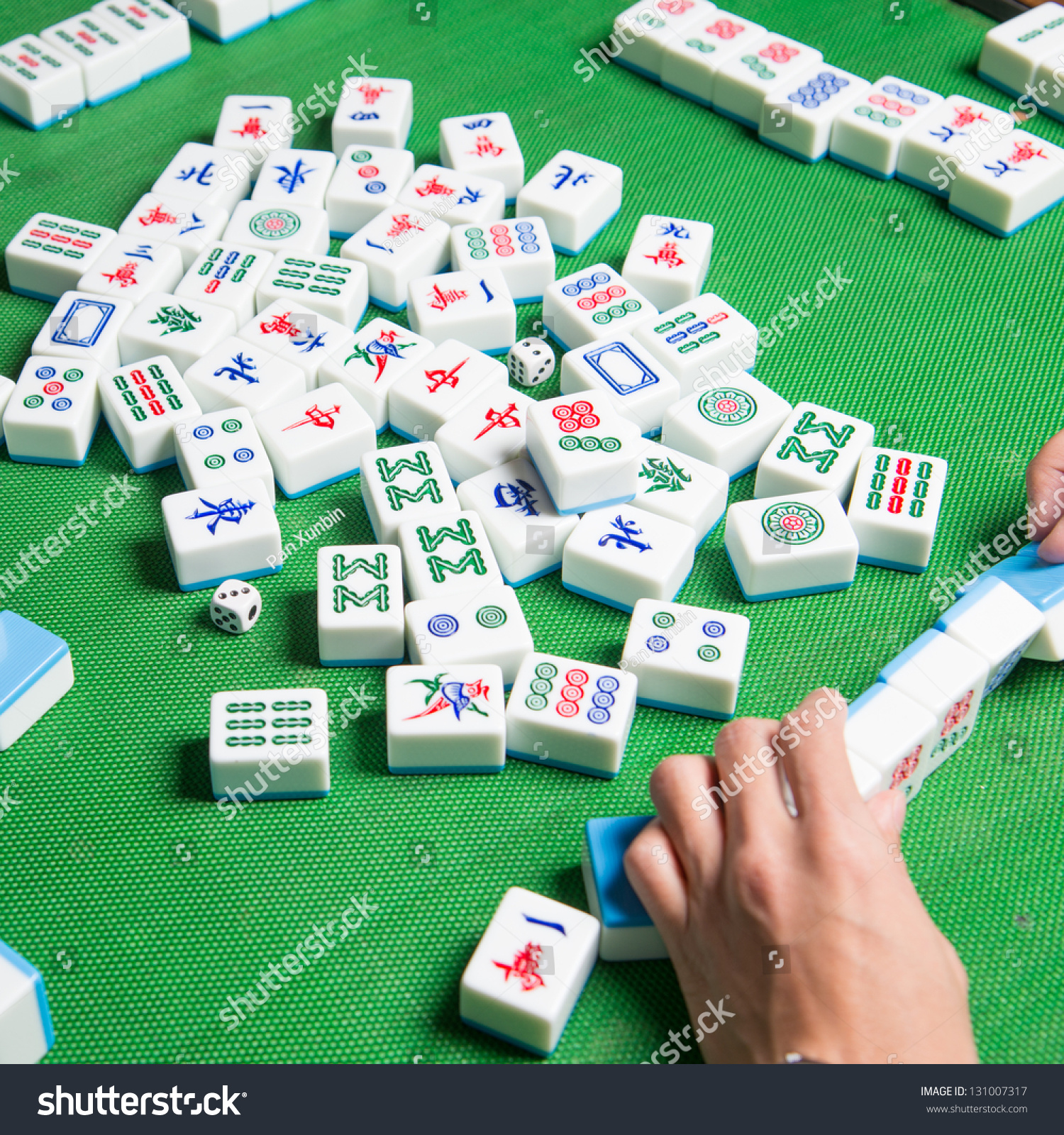 People Playing Mahjong Game Stock Photo (Edit Now) 131007317