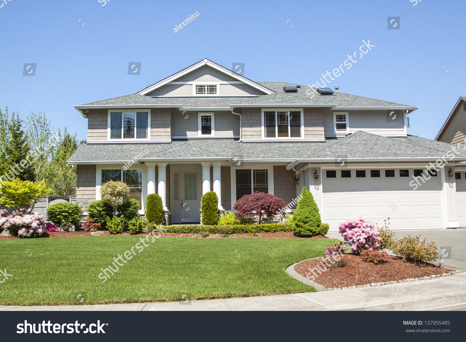 Perfectly Manicured Suburban House On Beautiful Stock Photo Edit Now