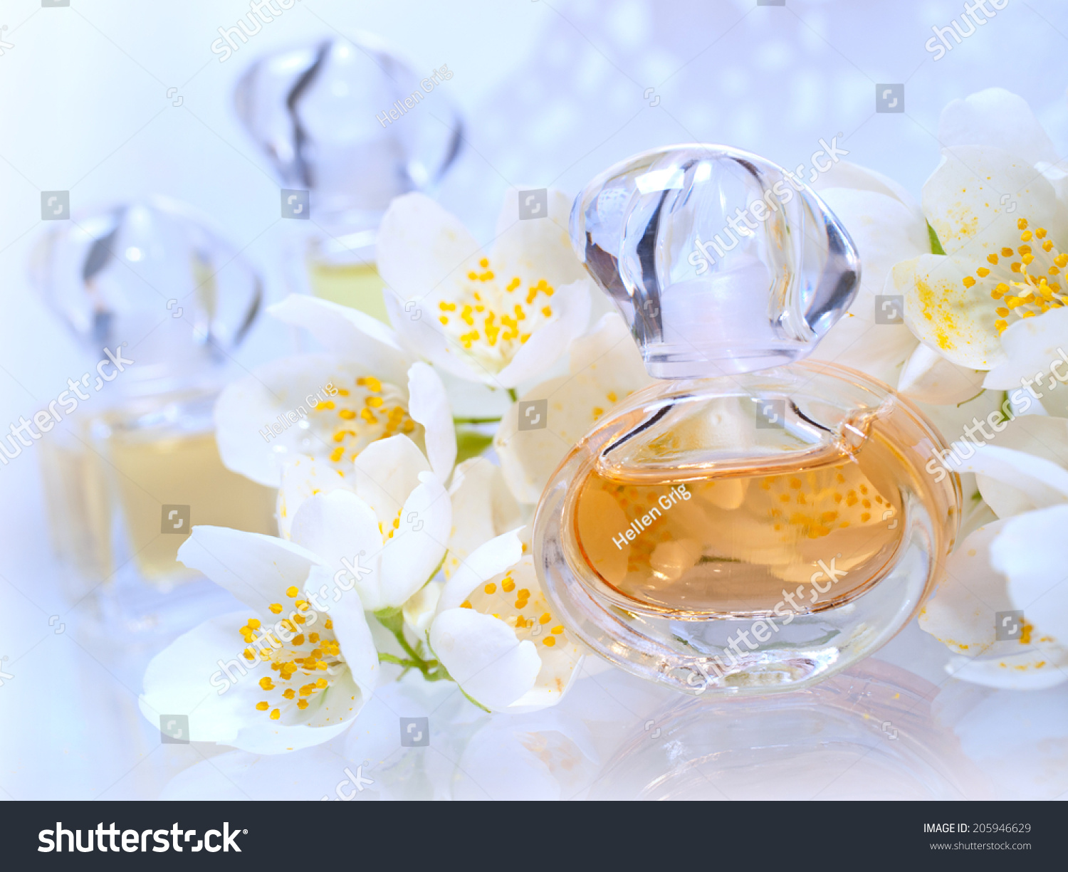 Perfume Bottles Jasmine Flowers On Blure Stock Photo 205946629 ...