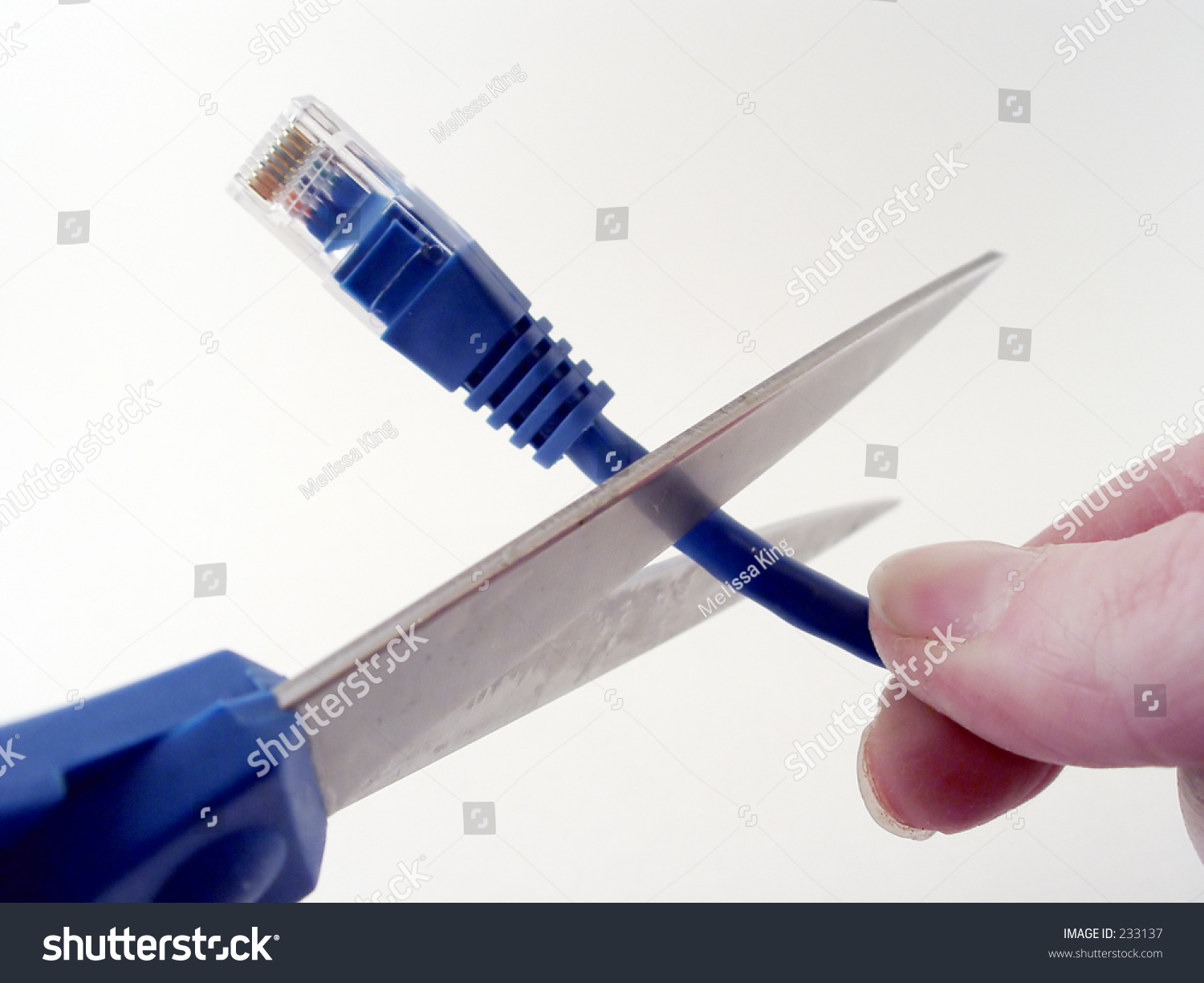 Person Going To Cut The Connection Of A Network Cable With Scissors ...