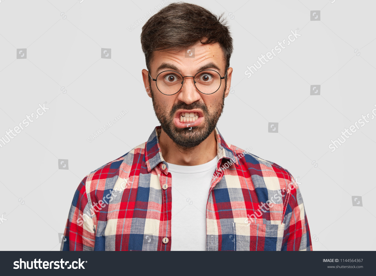 photo-irritated-unshaven-man-looks-angrily-stock-photo-1144564367