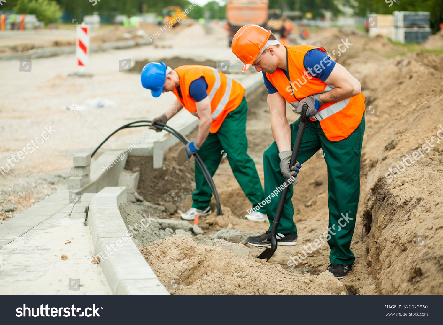 Photo Labourers Working On Road Construction Stock Photo 320022860 ...